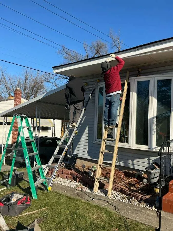 Restoration crew performing exterior repair in Urbana